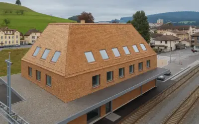 Biberschwanzziegel als Bahnhofshülle
